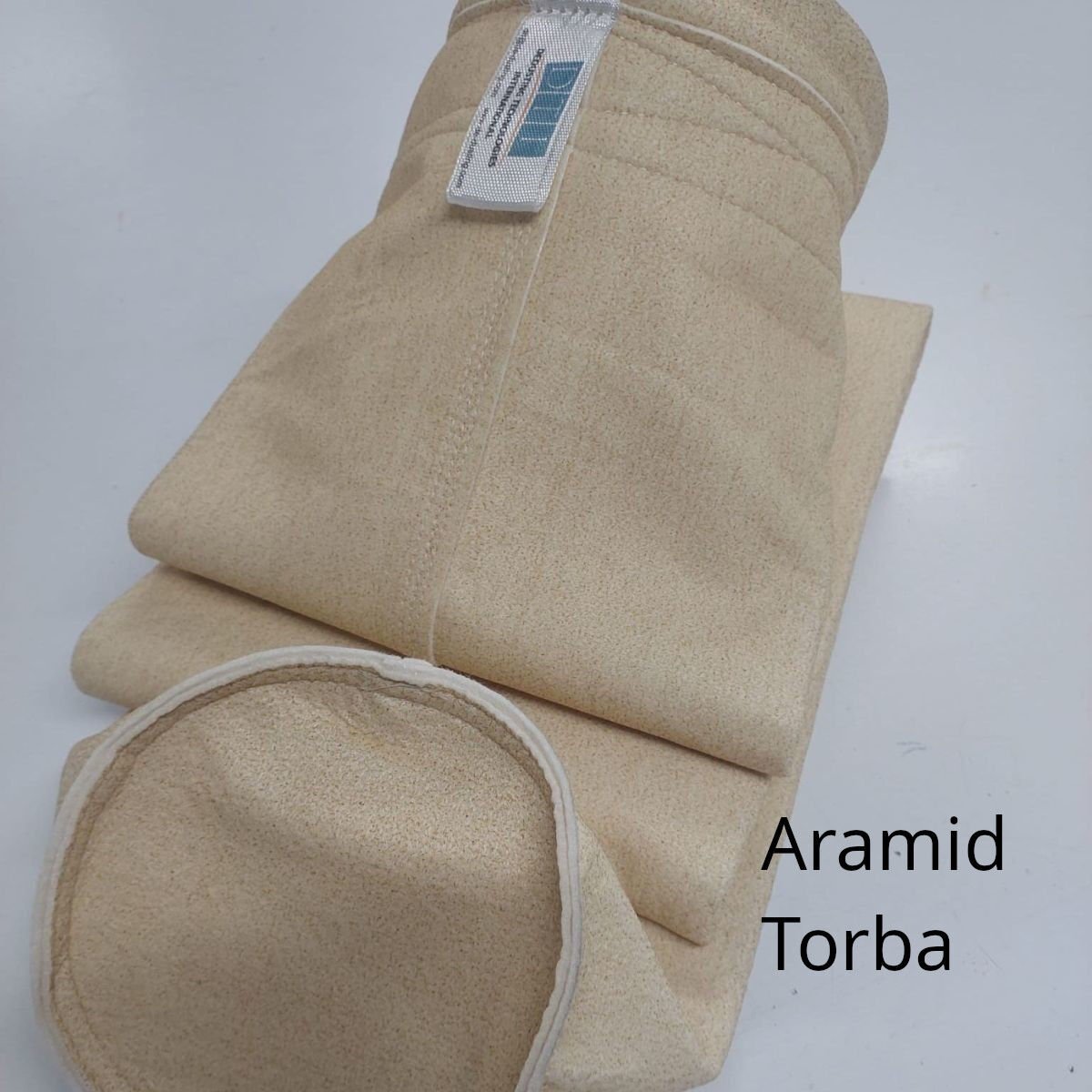 Filtre Torbası: Kumaş Cinsi: ARAMİD 500 gr/m2 Yüzey işleme: Hidrofob